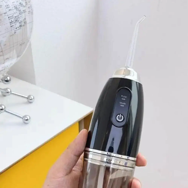 Irrigador dental con boquillas ortodónticas y periodontales